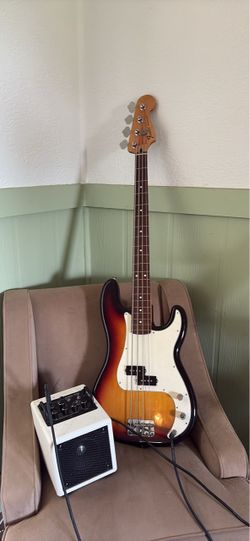 Make offer Fender electric bass guitar with Phil Jones Amp.