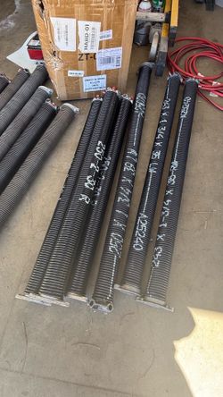 Garage Door Torsion Springs and Weatherstripping Trim