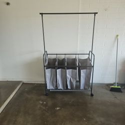 Laundry basket with hanging rack