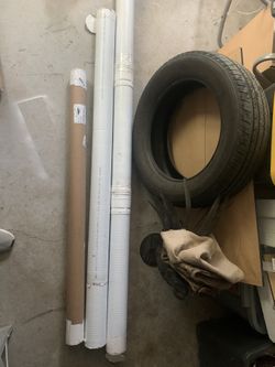 Three storage or shipping cotaniners 