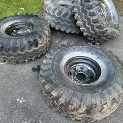 (4) 44/18.5/16.5 Gumbo Monster Mudders On 8 Lug Steel Wheels 