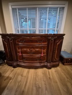 Large Ornate Wood Dresser with Carved Details