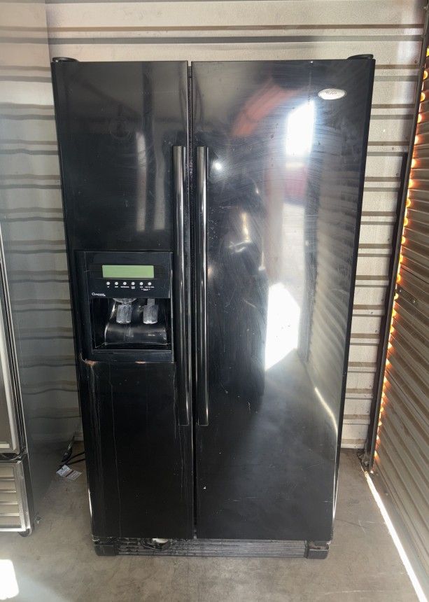 Black Whirlpool Refrigerator And Freezer