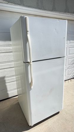 Fridge with top freezer