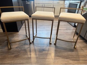24 inch beige /gold counterweight stools