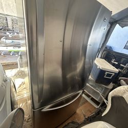 LG bottom-freezer refrigerator in a stainless steel finish