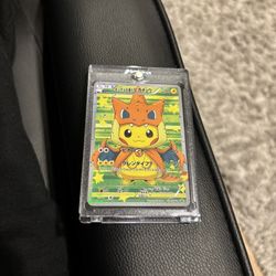 Poncho Wearing Pikachu Charizard