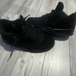 Jordan 4s black cats