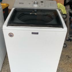 Maytag Washing Machine And  A Whirlpool Dryer 