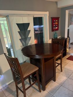 Pub Table/2 Chairs + Storage