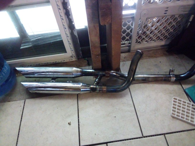 Screaming Eagle Exhaust Pipes For A Harley Davidson Sportster