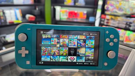 Switch lite turquoise color FULLY LOADED