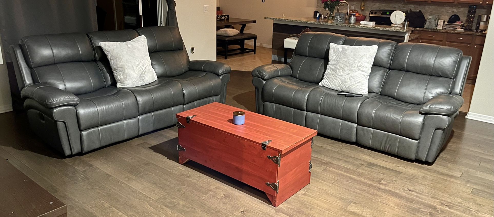 2 - Trevino Place Smoke Leather Dual Reclining Sofa’s