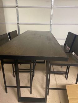 Counter height dining table and four modern stools