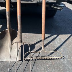 Antique Shovel, pitchfork , and hard rake