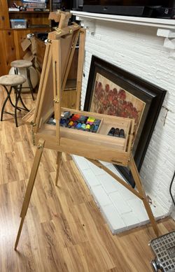 Easel with acrylic paints