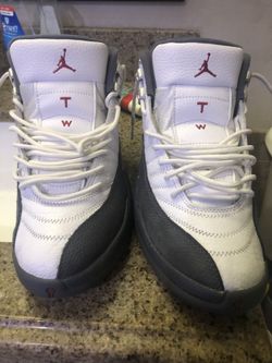 JORDAN 12 retro white and grey size 9.5....