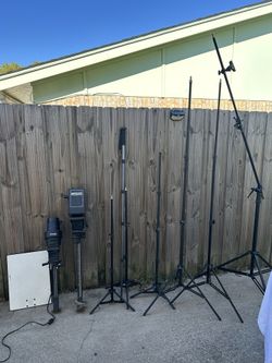 Photography tripods and photo enlargers