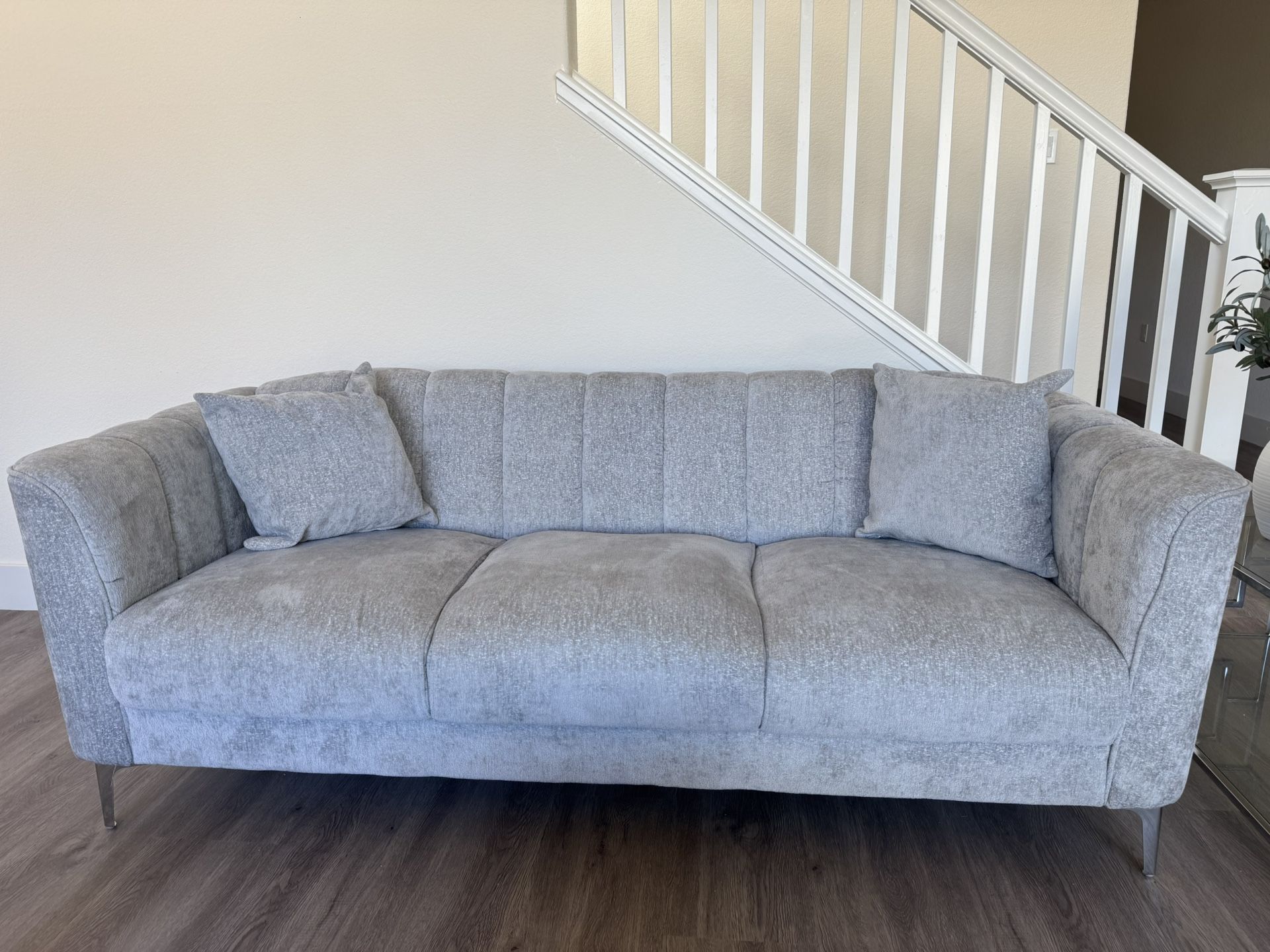 2 Sets Of Gray Sofas