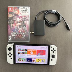 OLED Nintendo Switch System / Console - Works Great - Includes Charger and Game. Has some scratches but works great!