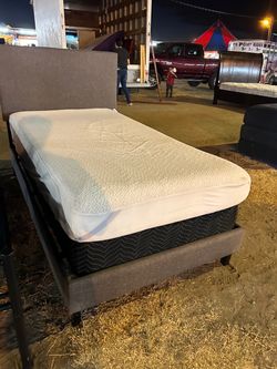Twin size bed frame with boxspring and mattress
