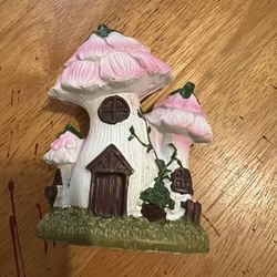 Mushroom house statue