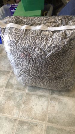 Gray and white comforter