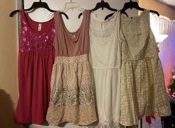 4 Used Girls dresses (size L): $18