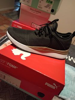 Black and gold pumas size 9 women's