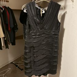 Woman’s Black Dress