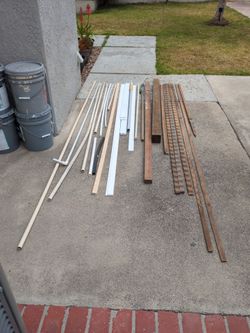 Various PVC pipes and wood parts for projects.
