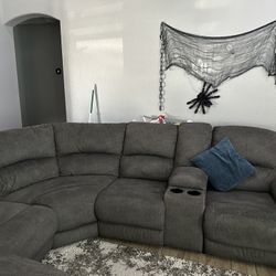 Sectional Recliner And Cup Holder