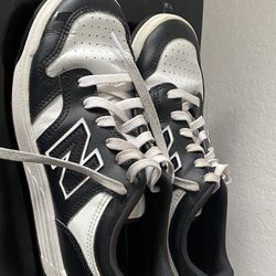 Women’s New Balance Black and White Sneakers