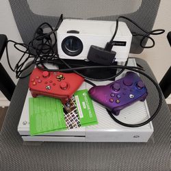Xbox 1s, Game Pass, 2 Controllers, Gaming Chair, Projector With roku 