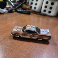 Maisto 1/64 scale diecast model of a 1959 Chevrolet Impala. 