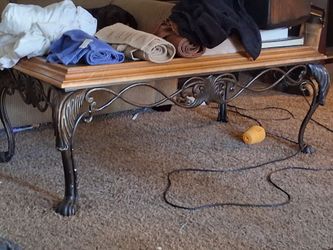 Iron, glass, and wood coffee table