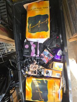 A bunch of Halloween costumes and Lighting black lights a lot of stuff $25