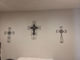 3 metal crosses