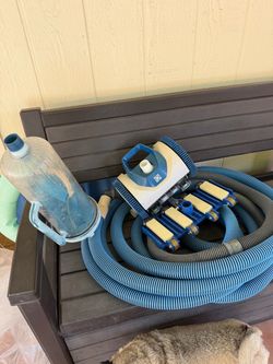 Pool vac with hose and other attachments