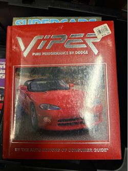 Two exotic automobile books sealed in plastic viper and Lamborghini