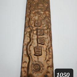 Copper Wall Art Depicting First Language 