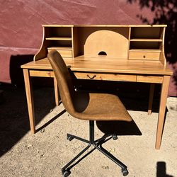 Beautiful wood desk with new rolling swivel chair 51” length  29”width & 4.5 height plenty of storage drawers good conditions
