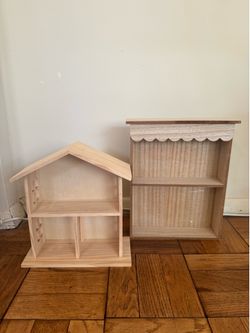 Small wooden dollhouse and shelf