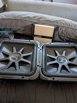 2 kickerL7 12's and JL audio amp