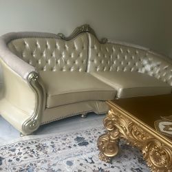 Cream Couch With Two Chairs Set And The Table 