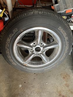 Good year wrangler SRA tire and rim