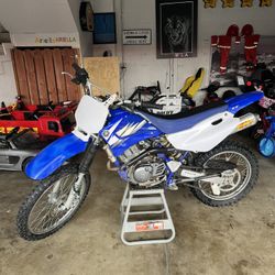 YAMAHA TT 125 PINK ON THAND TAGS CURRENT 