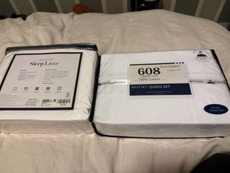 2 sets of new white queen sheets