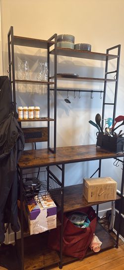 Shelf rack with storage and power outlet