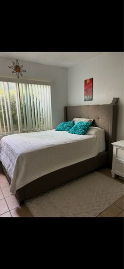 Queen bed frame, headboard and mattress.